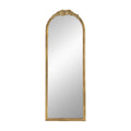 Antique gold arched floor mirror with floral crest