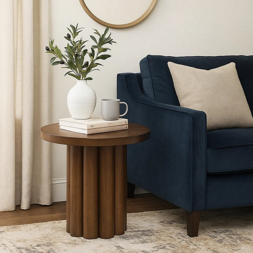 Sana fluted side table styled beside a sofa