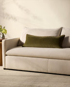 Liza velvet lumbar pillow on a bed
