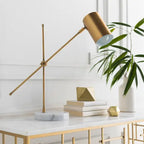Hannity brass lamp styled on a desk